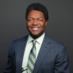 Headshot of Alix J. Charles, MD, FAAD